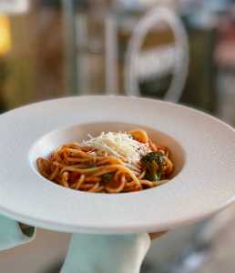 Pasta with vegetables in tomato sauce